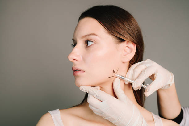 How do Jawline fillers help create a sculpted appearance?
